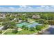 A lovely recreation area with basketball, tennis, and playground, adding activity and beauty to the community at 14006 Yellow Wood Cir, Orlando, FL 32828