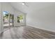 Spacious bedroom with sliding glass doors, providing access to the outdoor pool area at 14006 Yellow Wood Cir, Orlando, FL 32828