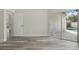 Bedroom with sliding glass door access to the screened in patio and pool area at 14006 Yellow Wood Cir, Orlando, FL 32828