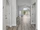 The bright foyer features hardwood floors leading to the living areas at 14006 Yellow Wood Cir, Orlando, FL 32828