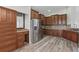 Updated kitchen featuring stainless appliances, custom cabinetry, and a functional layout at 14006 Yellow Wood Cir, Orlando, FL 32828