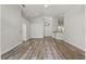 A spacious living room featuring hard wood floors and neutral paint colors at 14006 Yellow Wood Cir, Orlando, FL 32828