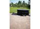 Backyard showing a paver patio with a hot tub and a large grassy area at 18805 Nettleton St, Orlando, FL 32833