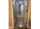 En suite bathroom entryway with tile floor and open access to shower at 18805 Nettleton St, Orlando, FL 32833