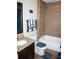 Well-maintained bathroom with shower, granite countertops, and modern fixtures, offering functionality and style at 18805 Nettleton St, Orlando, FL 32833