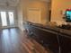 Spacious living room featuring hardwood floors, decorative molding, and stylish furniture at 18805 Nettleton St, Orlando, FL 32833