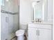 Modern bathroom featuring a glass-enclosed shower and stylish vanity at 235 Hampton Loop, Davenport, FL 33837