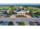 Stunning clubhouse featuring golf course views, meticulously landscaped grounds, and elegant architecture at 235 Hampton Loop, Davenport, FL 33837