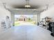 Spacious garage with view of the home's exterior at 235 Hampton Loop, Davenport, FL 33837