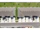 Aerial view of symmetrical rooftops, driveways and parking at 2845 Pierr St, Davenport, FL 33837