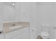 Clean bathroom featuring modern fixtures, vanity and toilet at 2845 Pierr St, Davenport, FL 33837