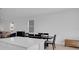 Bright dining room featuring dark wood table and white walls at 2845 Pierr St, Davenport, FL 33837