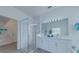 Contemporary bathroom showcasing a walk-in shower, double vanity and soaking tub at 2908 Sunset Lakes Blvd, Kissimmee, FL 34747