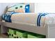 Close-up of Star Wars themed bedroom showcasing storage boxes under bed and fun decor at 2908 Sunset Lakes Blvd, Kissimmee, FL 34747