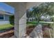 This home's entrance boasts a covered porch and well-maintained landscaping at 2908 Sunset Lakes Blvd, Kissimmee, FL 34747