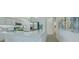 Modern kitchen with island, quartz countertops, stainless steel appliances, and bright white cabinetry at 2908 Sunset Lakes Blvd, Kissimmee, FL 34747