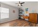 Bedroom featuring stylish decor, hardwood floors, and plenty of storage space at 3641 Bristol Cove Ln, St Cloud, FL 34772