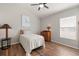 Cozy bedroom featuring hardwood floors and a comfortable bed for relaxing nights at 3641 Bristol Cove Ln, St Cloud, FL 34772