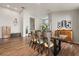 Elegant dining room featuring hardwood floors and a stylish dining set, great for Gathering meals at 3641 Bristol Cove Ln, St Cloud, FL 34772