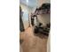Spacious walk-in closet with racks and shelves for efficient storage and organization of clothing and shoes at 3673 Caspian St, Leesburg, FL 34748