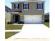 Charming two-story home featuring a spacious two car garage, neutral colors and a well-maintained lawn at 3673 Caspian St, Leesburg, FL 34748