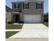 Charming two-story home featuring a spacious two car garage, neutral colors and a well-maintained lawn at 3673 Caspian St, Leesburg, FL 34748