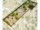 Aerial view of a sprawling lot with a house, pond, pool, and extensive green space at 3720 Edsel Ave, St Cloud, FL 34772