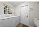 Well-lit laundry room with modern washer and dryer appliances at 3720 Edsel Ave, St Cloud, FL 34772