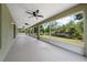Enclosed patio offers serene outdoor living space with views of the backyard at 3720 Edsel Ave, St Cloud, FL 34772