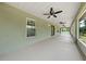 Expansive screened-in patio featuring ceiling fans and access to the backyard, great for entertaining at 3720 Edsel Ave, St Cloud, FL 34772