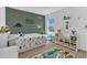 bedroom with dinosaur decor, a comfortable single bed, and plenty of storage space at 374 Pine Tree Bridge Trl, St Cloud, FL 34772