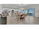 Bright and airy kitchen featuring stainless steel appliances, a large island with seating, and modern finishes at 374 Pine Tree Bridge Trl, St Cloud, FL 34772