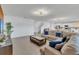 Inviting living space with a comfortable sectional sofa, stylish decor, and lots of natural light at 374 Pine Tree Bridge Trl, St Cloud, FL 34772
