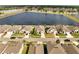 Wide aerial view of the community with surrounding lakes and lush landscape at 3844 Cabo Rojo Dr, St Cloud, FL 34772