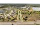 Aerial view of the neighborhood and nearby community at 3844 Cabo Rojo Dr, St Cloud, FL 34772