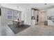 Stylish dining area with modern lighting, room for 6 and adjacent kitchen at 3844 Cabo Rojo Dr, St Cloud, FL 34772