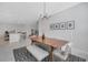 The dining room has seating for six and is open to the kitchen at 3844 Cabo Rojo Dr, St Cloud, FL 34772