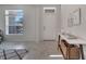 Inviting foyer with a console table and tiled floors by the front door at 3844 Cabo Rojo Dr, St Cloud, FL 34772