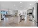 Spacious kitchen features a central island and stainless steel appliances, open to the living area at 3844 Cabo Rojo Dr, St Cloud, FL 34772