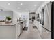Kitchen featuring stainless steel appliances, a center island, and modern cabinetry at 3844 Cabo Rojo Dr, St Cloud, FL 34772