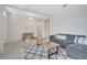 Open-concept living room featuring neutral walls, comfortable seating and an area rug at 3844 Cabo Rojo Dr, St Cloud, FL 34772