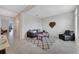Cozy living room featuring neutral walls, comfortable seating, and stylish rug at 3844 Cabo Rojo Dr, St Cloud, FL 34772
