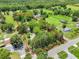 Beautiful aerial view of land with mature trees surrounded by a red boundary line at 429 Diamond Acres Rd, Davenport, FL 33837