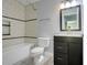 Bright bathroom with tiled shower and vanity at 429 Diamond Acres Rd, Davenport, FL 33837