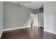 Bedroom featuring wood floors and natural light at 429 Diamond Acres Rd, Davenport, FL 33837