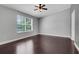 Bright bedroom with hardwood floors and ample light at 429 Diamond Acres Rd, Davenport, FL 33837