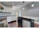 Kitchen island featuring stainless steel dishwasher and granite countertop at 429 Diamond Acres Rd, Davenport, FL 33837