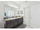 Bright bathroom featuring a double sink vanity with great lighting at 4324 Desert Rose, Kissimmee, FL 34746
