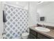 Clean bathroom with a shower/tub combo and decorative curtain at 4324 Desert Rose, Kissimmee, FL 34746
