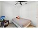 Small bedroom with simple decor, carpeted flooring, and ceiling fan at 4324 Desert Rose, Kissimmee, FL 34746